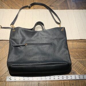 Jessica Simpson bag. 13in x14 in black polyurethane purse